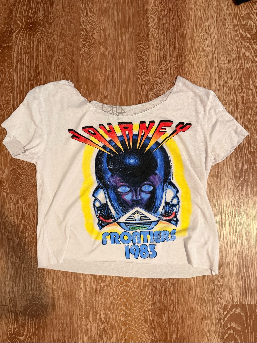 Journey off the shoulder cut band tee
Fits XS-S